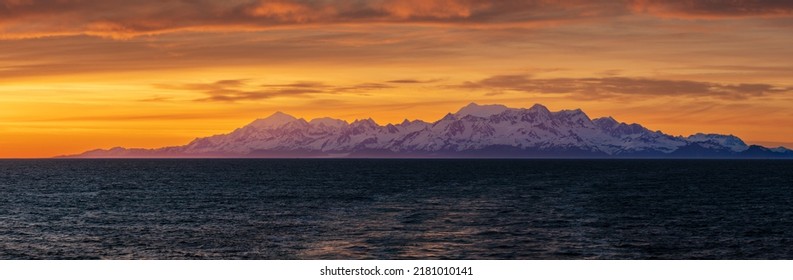 Late Evening Sunset On Panorama Of Mountains And Mount Fairweather By Glacier Bay National Park In Alaska