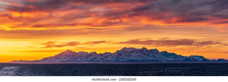 Late Evening Sunset On Panorama Of Mountains And Mount Fairweather By Glacier Bay National Park In Alaska