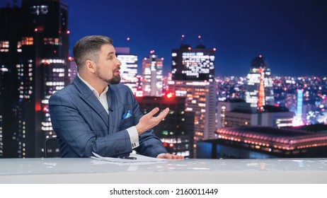 Late Night TV Talk Show Live News Program: Charismatic Male Anchor Presenter Reporting. Television Cable Channel Anchorman Host Talks. Network Broadcast Newsroom Studio Mockup.