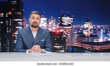 Late Night TV Talk Show Live News Program: Charismatic Male Anchor Presenter Reporting. Television Cable Channel Anchorman Host Talks. Network Broadcast Newsroom Studio Mockup.