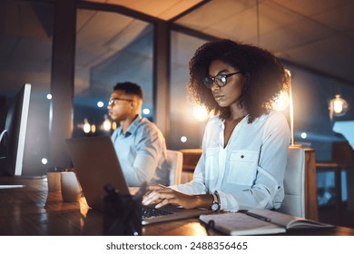 Late, night and woman with laptop in office for project report, information and reading IT news. Developer, people and notebook with tech for software development, deadline or open source research