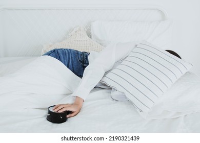 Late Night Woman : Lazy Girl Spent The Night In Bed Put On Jeans Without Changing Her Clothes Covered Her Face With Pillows Slept And Woke Up Late Using Her Hands To Turn Off The Alarm Of The Clock.