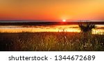 A late October sunrise over Port Royal Sound at high tide, in Beaufort County, SC, just north and a bit west of Hilton Head Island.