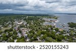 Late summer, early fall aerial, drone, photo of the St Michaels Maryland skyline and the Chesapeake Bay.  September 2024.