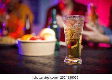 In a late-night office party, a group of Asian men gathers with beer glasses, surrounded by stacks of paper, celebrating and unwinding after a long workday, blending fun and professionalism. - Powered by Shutterstock