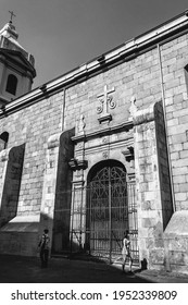 Lateral Entrance Door Of The Old Santo Domingo Church In Downtown With Two Women Walking (in Black And White), Santiago, Chile