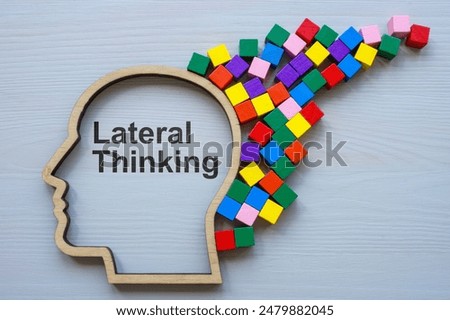 Lateral thinking concept. Head and colored cubes.