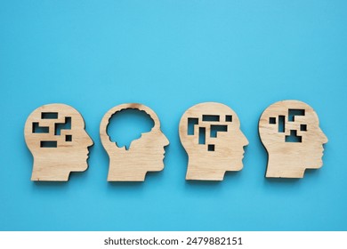 Lateral thinking or emotional intelligence. Models of the head with the brain.