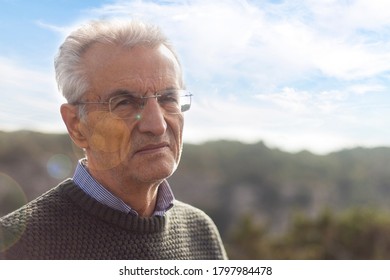 Laterza, Taranto Puglia/ Italy - December 2 2018: Sunny Autumn Daytime Outdoor With Blue Sky And Clouds Senior Italian Man With Tall Skinny White Short Hair With Sweater