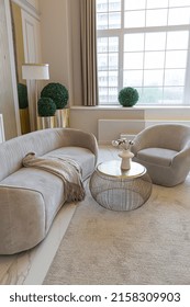 The Latest Fashion Home Trends In An Ultra Modern Elegant Interior Of A Cozy Studio In Soft Pastel Colors. Close-ups Of A Stylish Living Area With Golden Elements