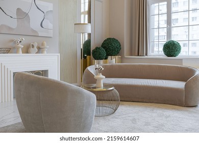 The Latest Fashion Home Trends In An Ultra Modern Elegant Interior Of A Cozy Studio In Soft Pastel Colors. Close-ups Of A Stylish Living Area With Golden Elements