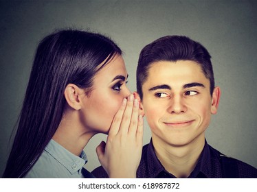 Latest rumors. Curious man listening gossip in the ear  - Shutterstock ID 618987872