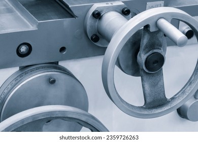 Lathe control knobs close up blue tone. Metal machine tools industry. The metalworking process by turning machine. industry metal processing concept 