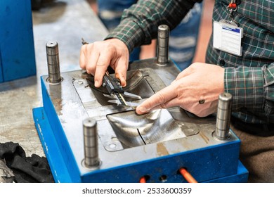 Lathe worker man working with a vernier and milling machine in a factory, using a caliper to check measurement. - Powered by Shutterstock