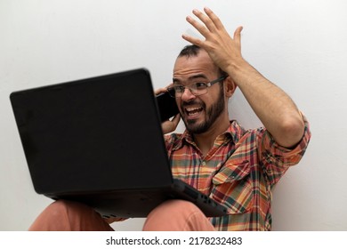 Latin American Man With His Laptop Computer Is A Programmer And Specializes In Web Development.