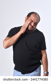 Latin American Man With Toothache On White Background