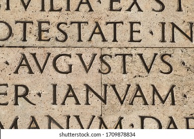 Latin Ancient Language. Inscription From The Famous Res Gestae (1st Century AD), With The Word Augustus In The Center