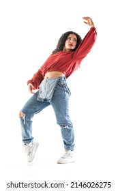 Latin Brunette Woman Dancing In Studio With White Background