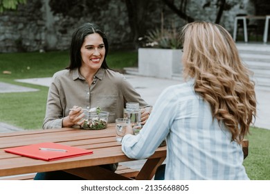 Latin Business Women Middle Age And Colleagues Eating Salad At The Office Terrace In Mexico Latin America