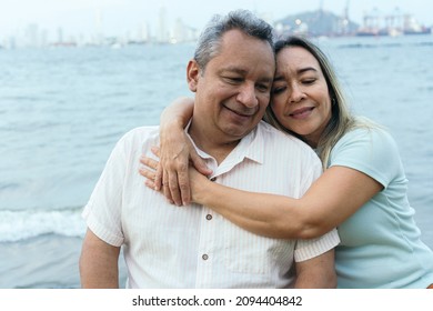 Latin Couple Having Fun In The Park.