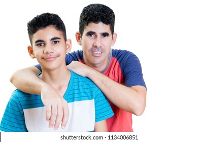 Latin father and his teenager son isolated on white