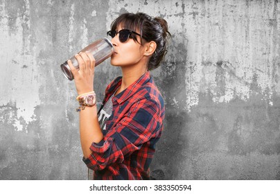 Latin Girl Drinking A Beer