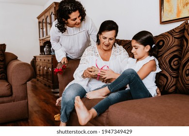 Latin Grandmother Woman With Daughter Or Grandchild Celebrating Birthday, 8 March International Women Holiday Or Happy Mother's Day In Mexico City