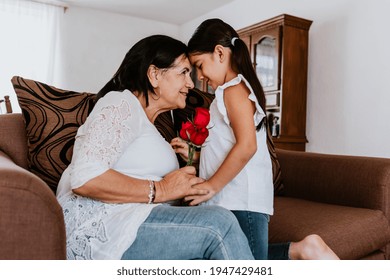 Latin Grandmother Woman With Daughter Or Grandchild Celebrating Birthday, 8 March International Women Holiday Or Happy Mother's Day In Mexico City