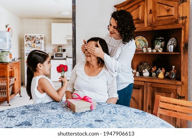 Latin Grandmother Woman With Daughter Or Grandchild Celebrating Birthday, 8 March International Women Holiday Or Happy Mother's Day In Mexico City