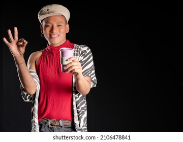 latin man with beret and coffee mug in his hand