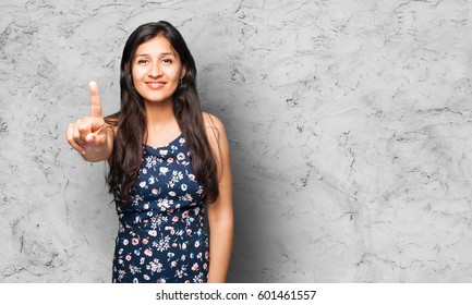 Latin Woman Doing Number One Gesture