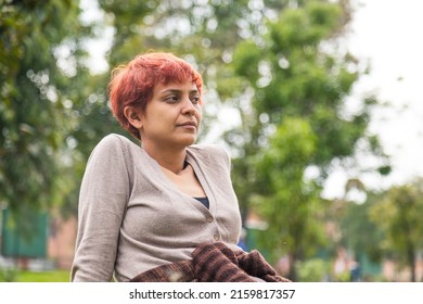 Latin Woman Sunbathing In The Park Bogota Colombia