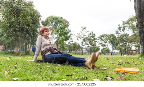 Latin Woman Sunbathing In The Park Bogota Colombia