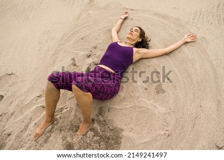 Similar – Image, Stock Photo Tattooed woman in front of a painted wall