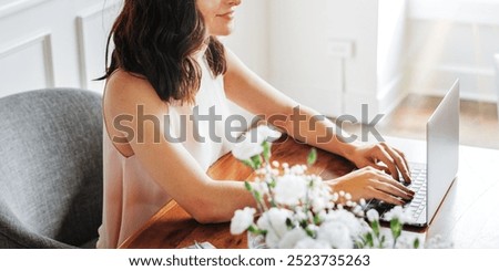 Similar – Woman makes wildflower bouquet in vase on the table