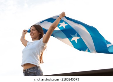 Latina Girl From Guayaquil Smiles As She Holds The City's Flag In Honor Of The Independence Celebrations On October 9th.