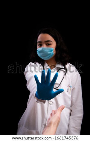 Latina health worker refusing hand shake