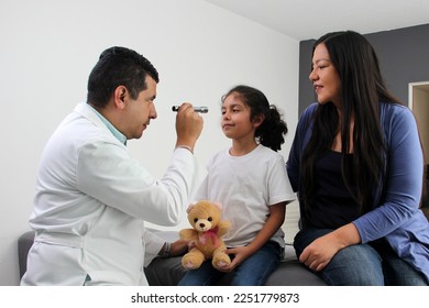 Latina mother cares for and accompanies her curly little daughter at the dark-haired pediatrician specialist doctor's office to prevent abuse and harassment at her medical checkup
 - Powered by Shutterstock