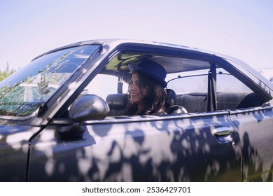 latina woman whit hat drives vintage car - Powered by Shutterstock