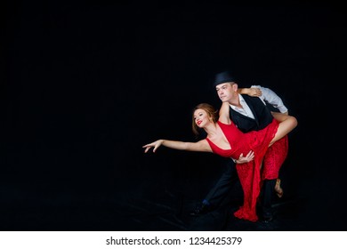 Latino dancers in ballroom