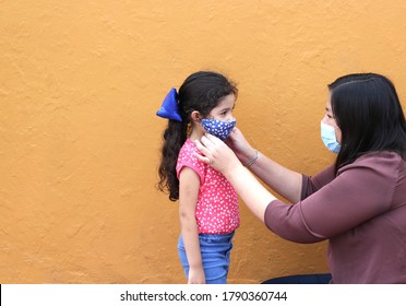 Latino Family, Woman And 6-year-old Girl With Covid-1 Protection Mask, Ready For Back To School