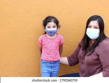 Latino Family, Woman And 6-year-old Girl With Covid-1 Protection Mask, Ready For Back To School