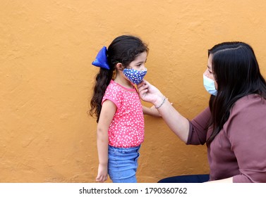 Latino Family, Woman And 6-year-old Girl With Covid-1 Protection Mask, Ready For Back To School