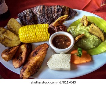 Latino Food Arrangement, Guatemala. Corn, Potatoes, Meat, Plantains, Avocado, Carrot, Bread.