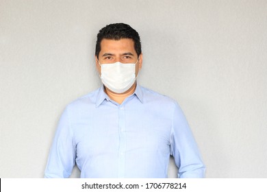 Latino Man With Protection Mask Clinical Use To Prevent Covid-19, New Normal Due To Pandemic