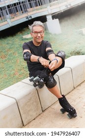 Latino Senior Man Putting On His Roller Skates