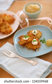 Latkes, Or Potato Pancakes, Served With Onions, Sour Cream And Applesauce, Commonly Served At Hanukkah.