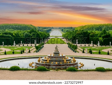 Latona fountain and Versailles park landscape at sunset, Paris suburbs, France
