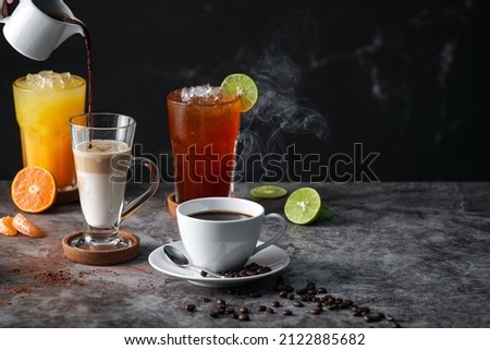 Latte, Americano, Orange juice, Lime tea served on dark background.