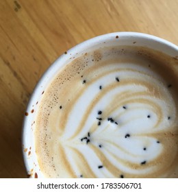 Latte art with black lava salt